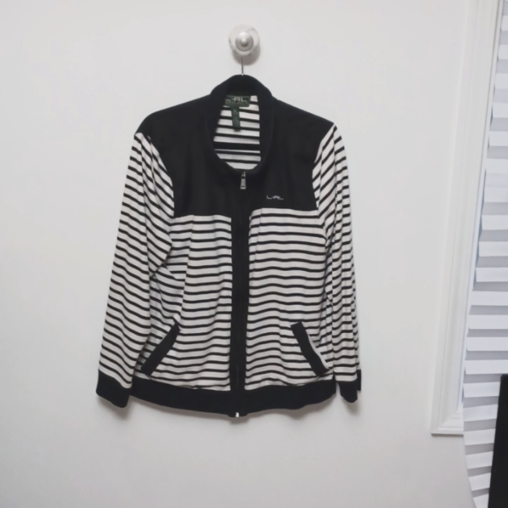 Ralph Lauren light cotton jacket. Pockets and zips up front